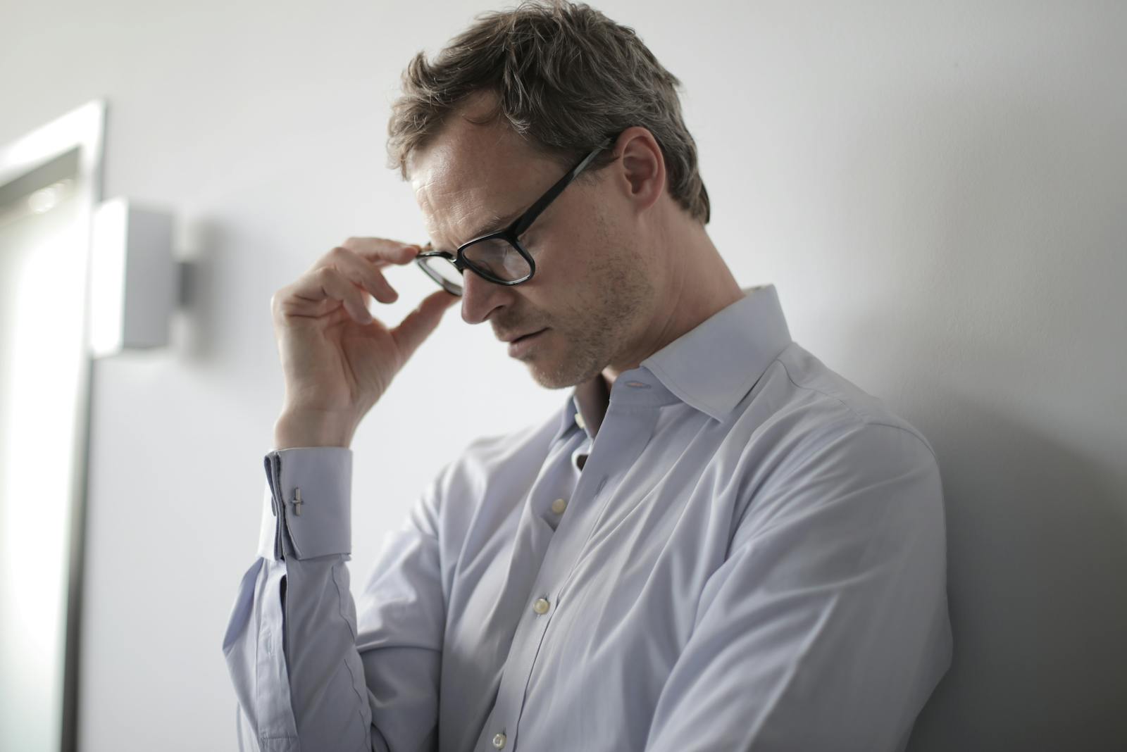 How Ordinary People Change the World with Ownership: An adult man appears stressed thinking how to solve a problem.